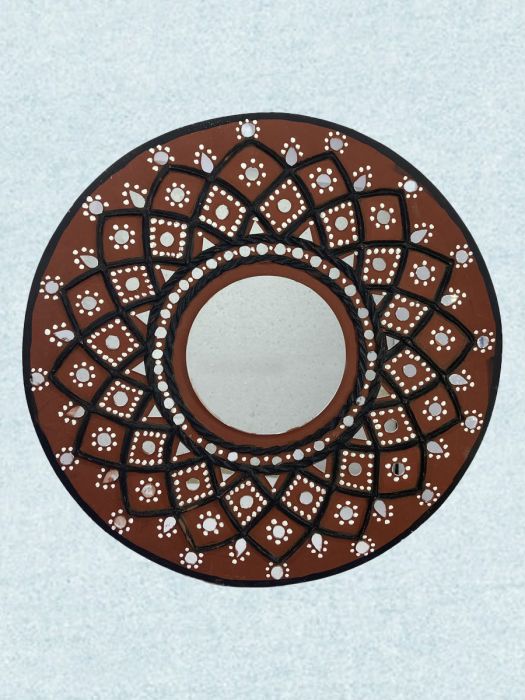 Traditional lippan art with mirrors, made by skilled artisans