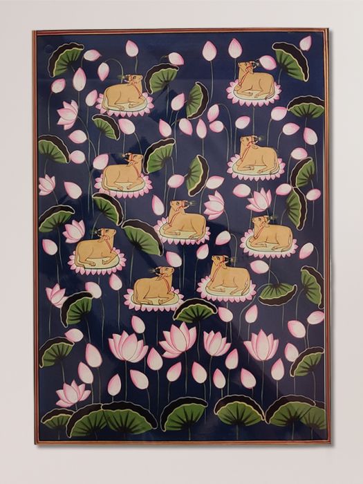 Traditional Pichwai painting of cows on lotus flowers