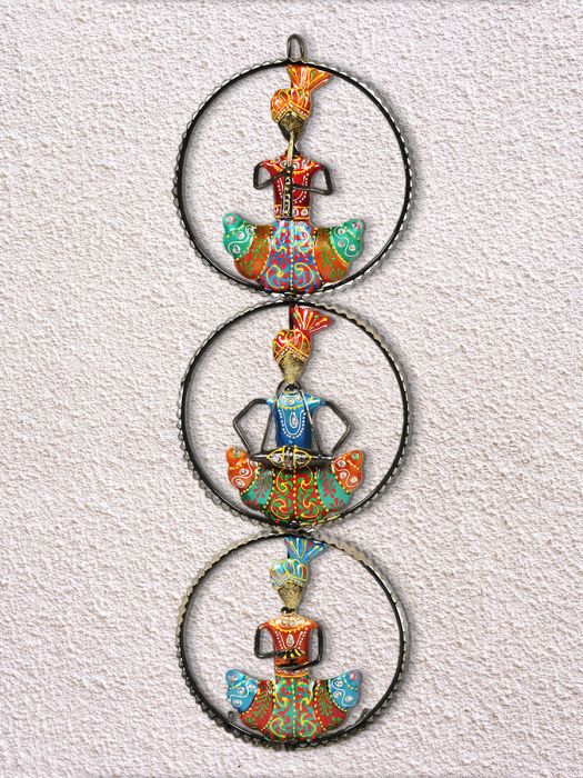 Hand made wall decor of seated Rajasthani musician trio