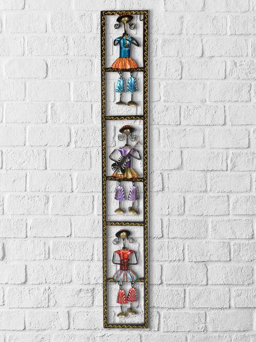 Hand made Wall hanging of three women musicians with dangling feet playing a lively tune